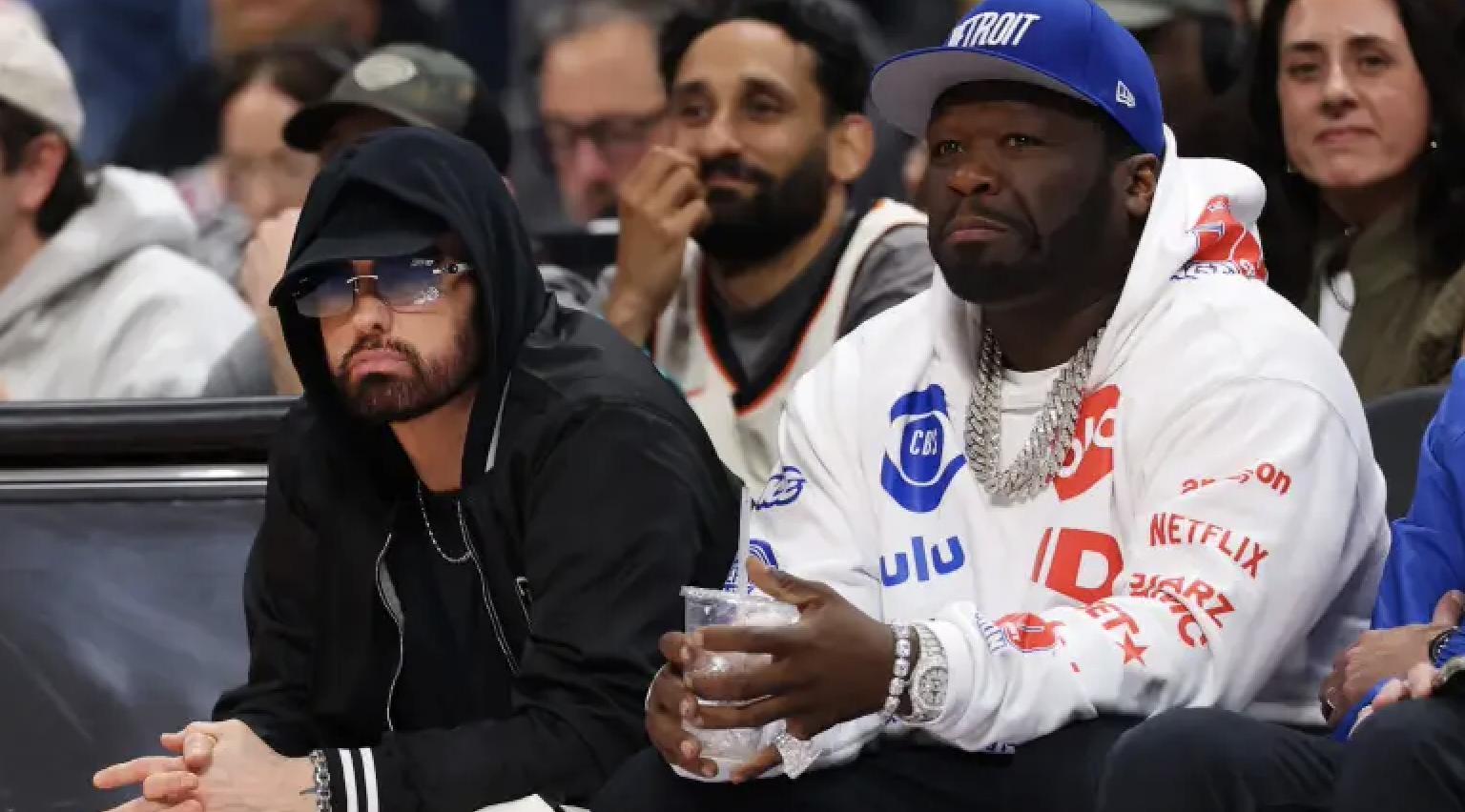 Eminem and 50 Cent Sit Together Courtside at Detroit Pistons Playoff Game￼￼